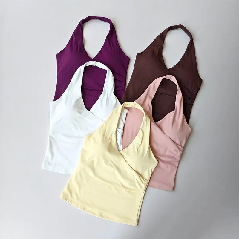 Top deportivo sexy con cuello en V y espalda cruzada, sin mangas, con almohadillas, efecto segunda piel, diseño de espalda atractiva, para yoga y fitness.