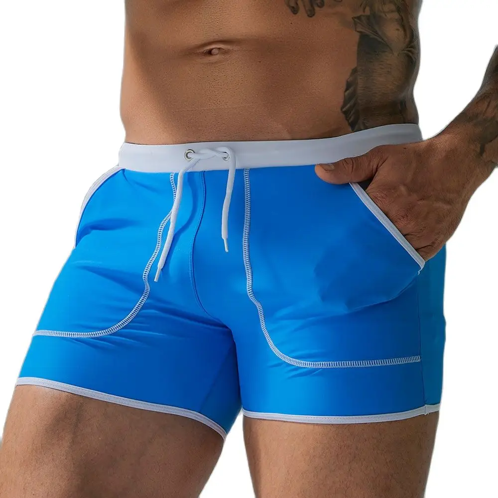 Bañadores de marca para hombre, bañadores sexys para exteriores, traje deportivo elástico para playa, surf, pantalones cortos, traje de baño para hombre, pantalones de natación