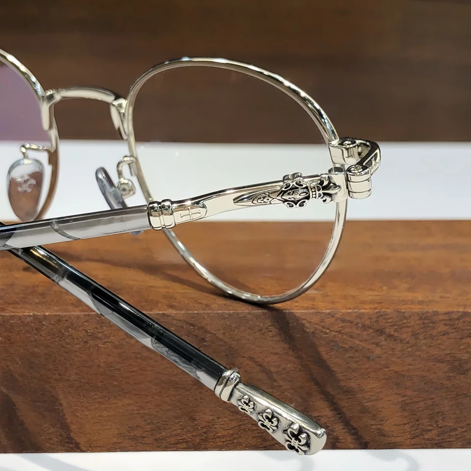 Gafas redondas de aleación de titanio a la moda, montura de gafas de alta calidad, diseño de marca, gafas graduadas ópticas para miopía para hombres y mujeres