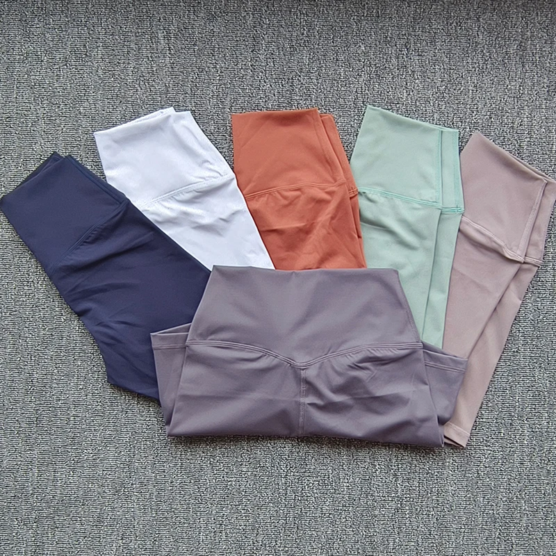 Pantalones cortos deportivos para mujer, pantalones cortos de Yoga de cintura alta, ajustados, levantadores de glúteos, gimnasio, correr, pantalones cortos de nailon de alta elasticidad