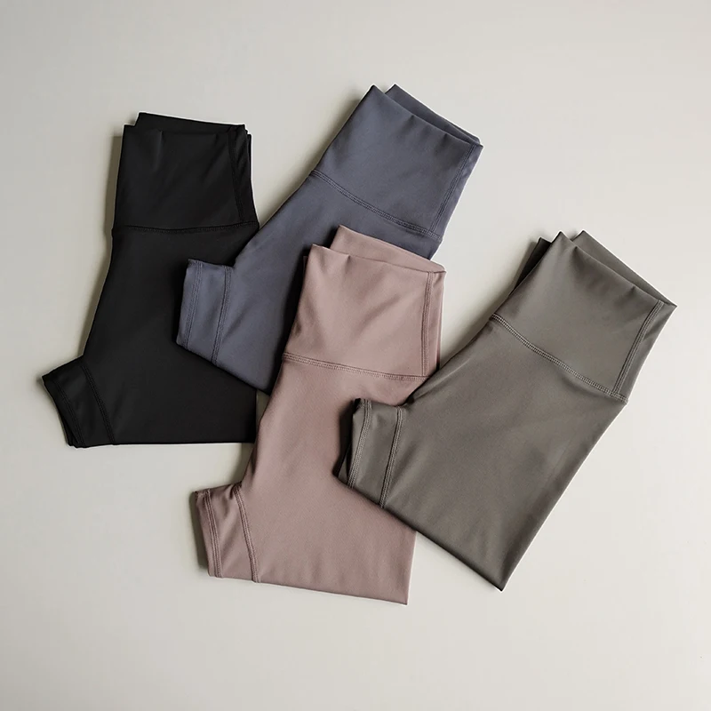 Pantalones deportivos elásticos ajustados sin costuras Yoga desnudo cintura alta levantamiento de cadera secado rápido mallas deportivas para correr ropa al aire libre