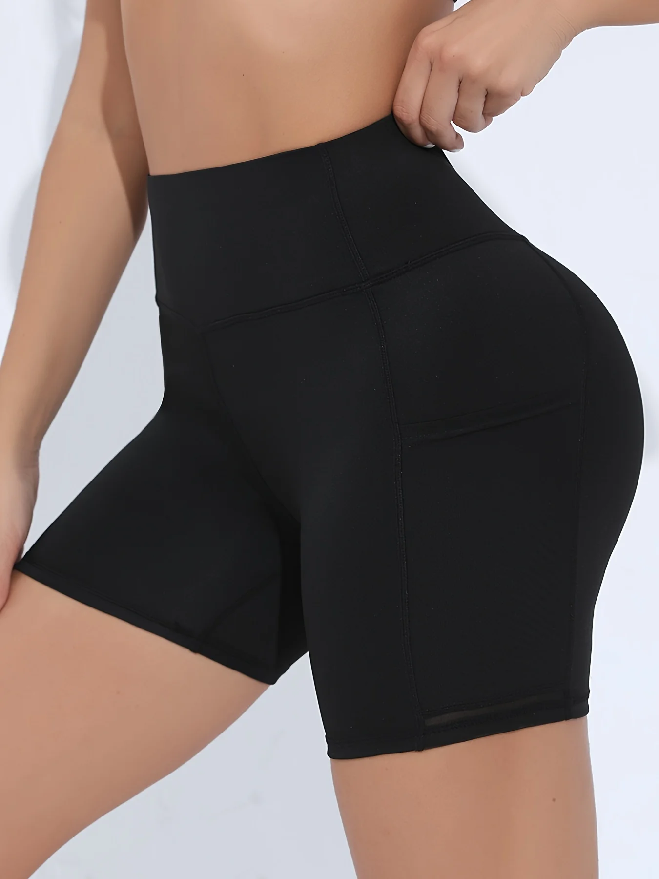 Pantalones cortos de yoga de cintura alta de malla con bolsillo Pantalones cortos de ejercicio para mujer