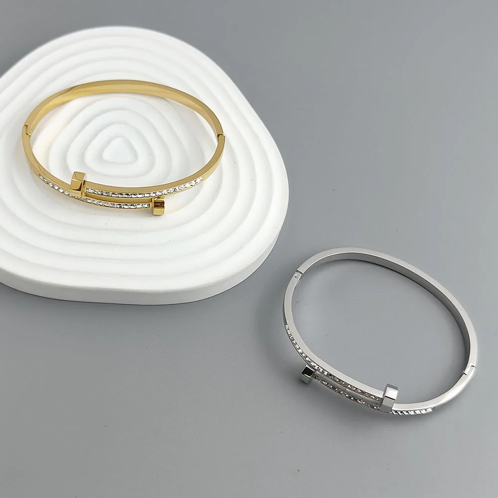Nueva pulsera chapada en oro de acero inoxidable con circonita para uñas de 18 quilates, pulsera de pareja impermeable de alta calidad, regalo para esposa