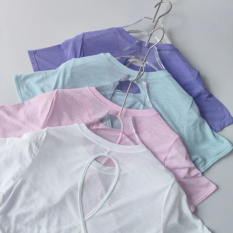 Ropa de Yoga para mujer, blusa de manga corta con Cruz hueca, malla fina, parte de atrás bonita, camisas exteriores, Top deportivo ajustado para Fitness
