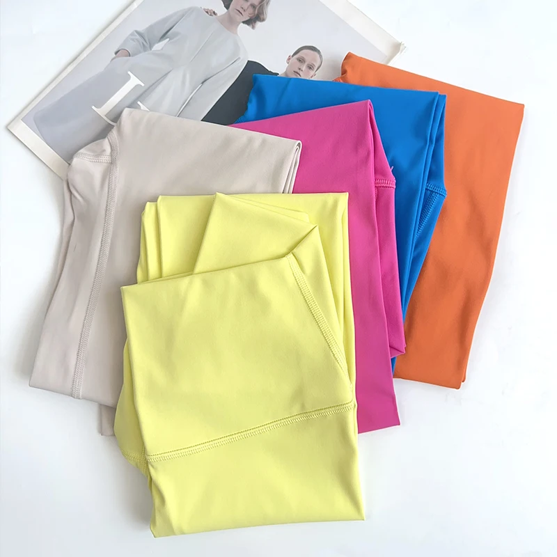 Nueva serie de colores, sensación desnuda, cintura alta, mallas deportivas para Yoga para mujer, aspecto elástico cómodo, pantalones deportivos de ocio para correr más delgados