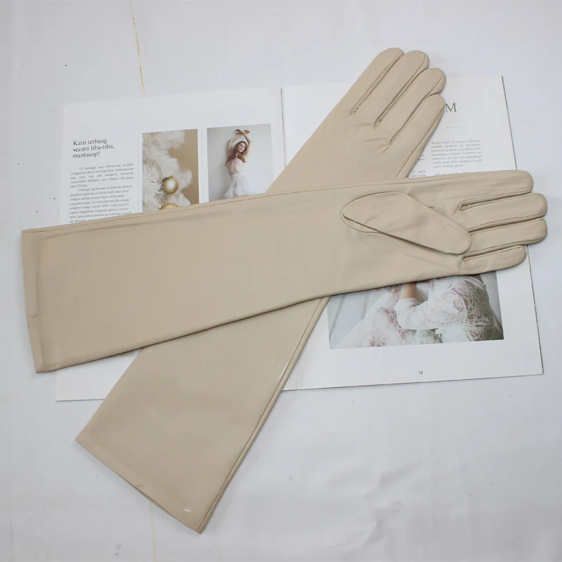 Nuevos guantes largos de piel de oveja para mujer, guantes de invierno de piel auténtica con forro de terciopelo cálido y versátil de Color sólido
