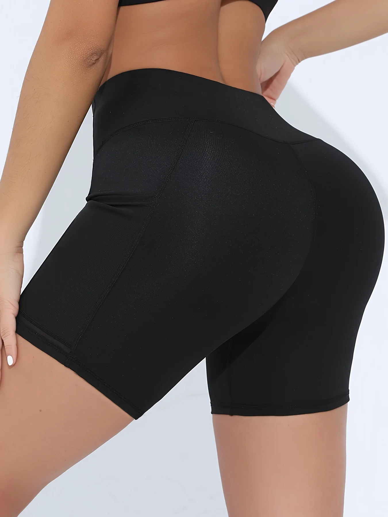 Pantalones cortos de yoga de cintura alta de malla con bolsillo Pantalones cortos de ejercicio para mujer