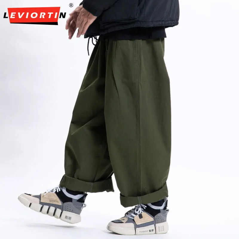 2025 primavera nuevos pantalones casuales Cityboy moda holgada japonesa pantalones de pierna ancha versátiles pantalones de trabajo de Color sólido hombres y mujeres