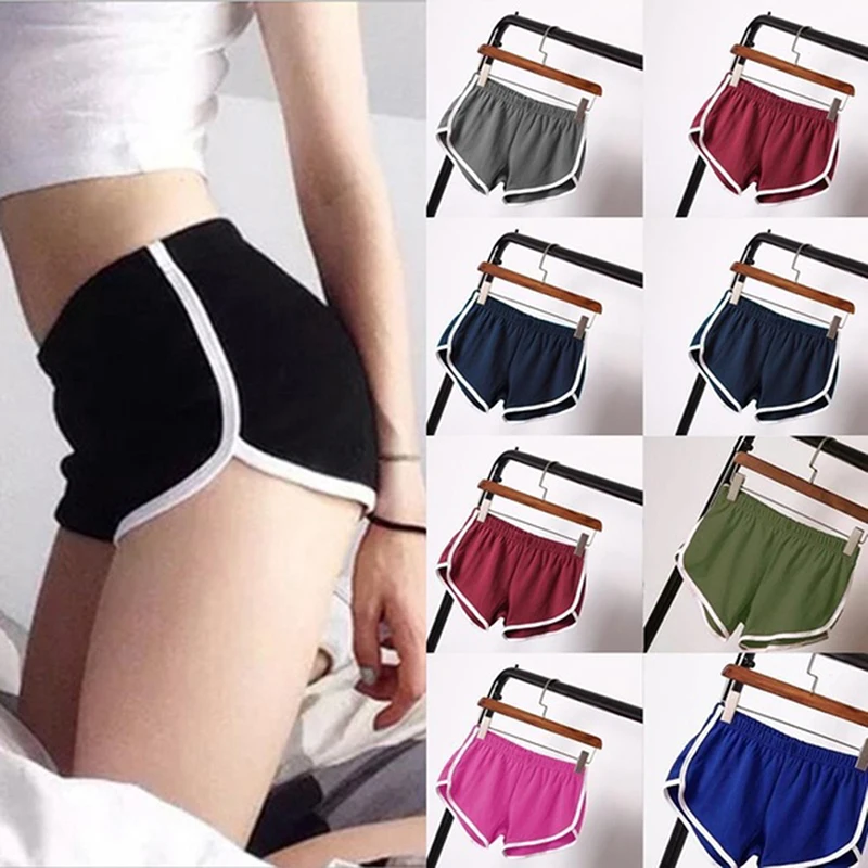 Pantalones cortos deportivos para mujer verano 2025 nuevo Color caramelo Anti vaciado pantalones cortos ajustados Casual señora cintura elástica playa Correndo pantalones cortos