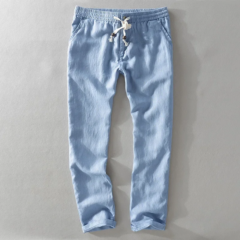Pantalones de lino para hombre, ropa informal de Color sólido con cuerda de tubo recto, transpirable, novedad