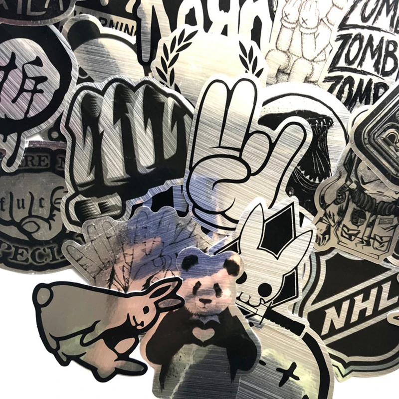 10/30/50/100 Uds. Imitando el logotipo de la marca de Metal pegatinas de banda de Rock Graffiti monopatín equipaje fresco PVC pegatina impermeable juguetes para niños