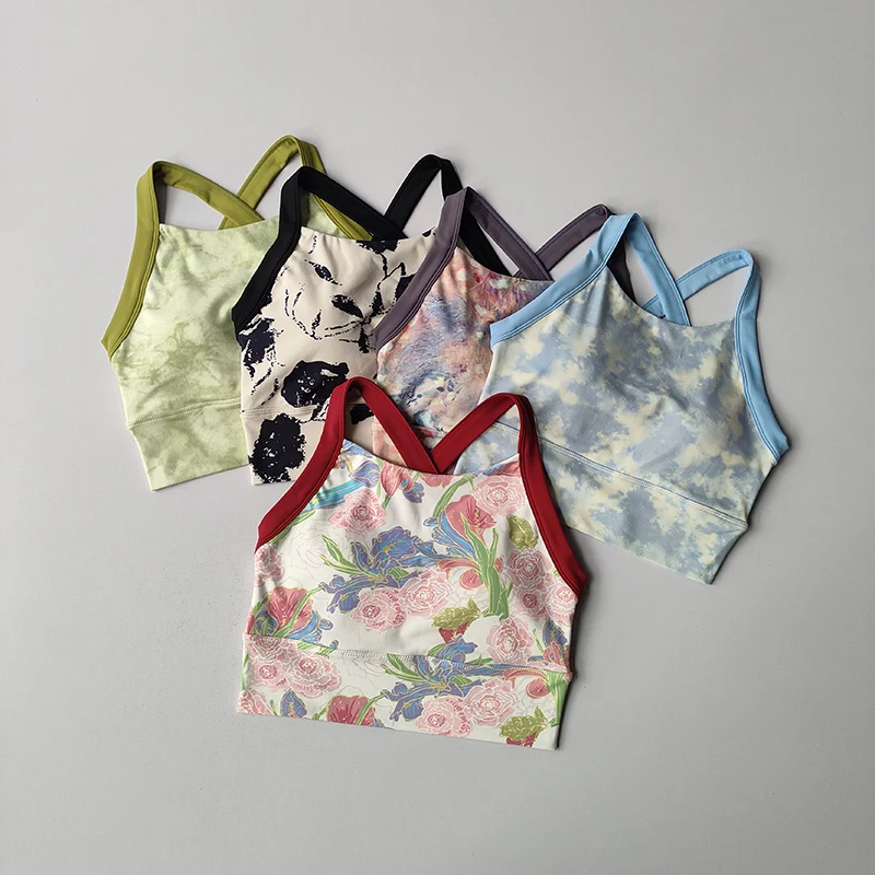 Nueva lencería de Yoga de alta gama para mujer, ropa interior de una pieza con copa fija a prueba de golpes, sujetador con tirantes anchos estampados sexis