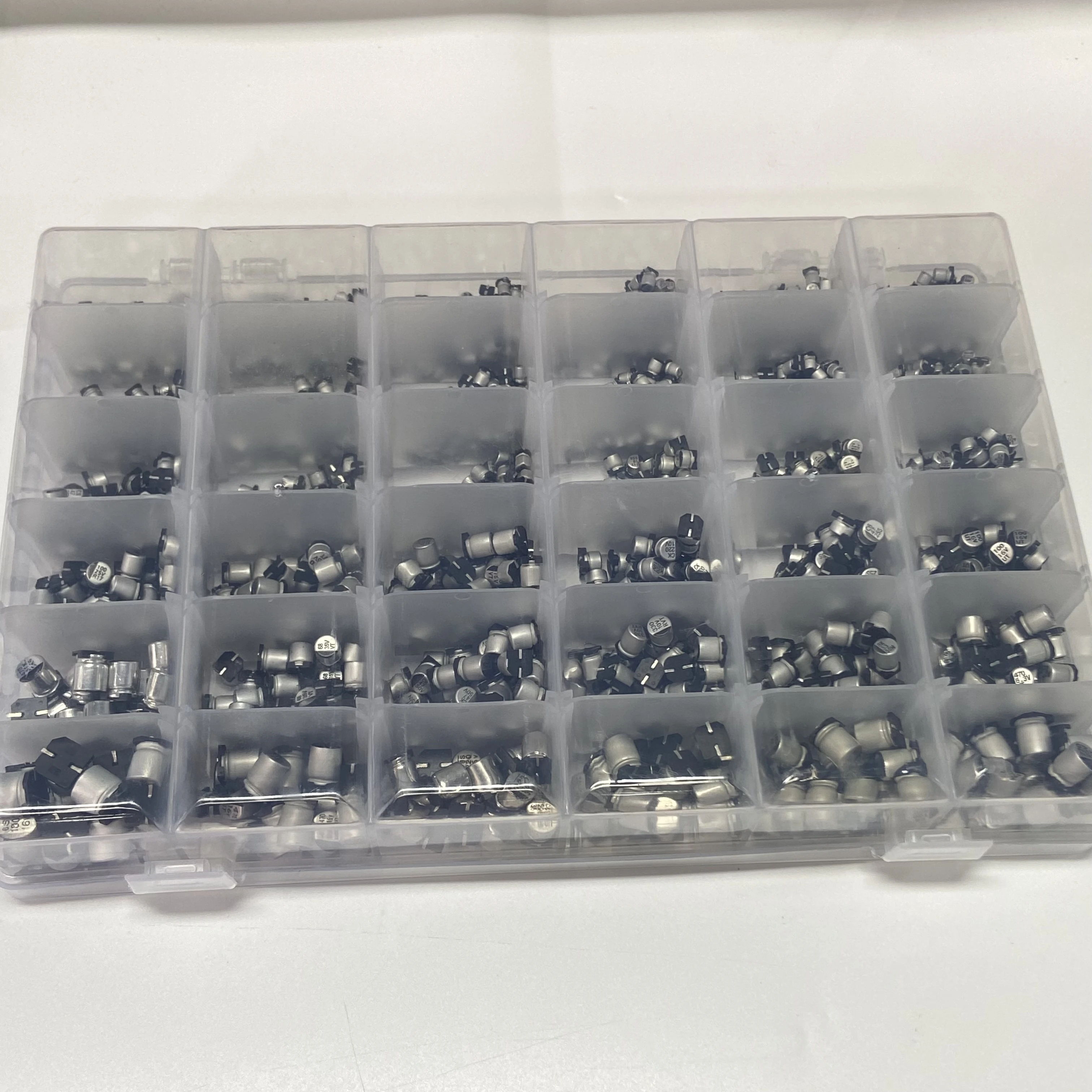 Condensadores electrolíticos de aluminio, Chip SMD de 1500 piezas, caja de muestra de 36 valores, condensadores electrolíticos de aluminio 1UF ~ 1000UF 4V-60V