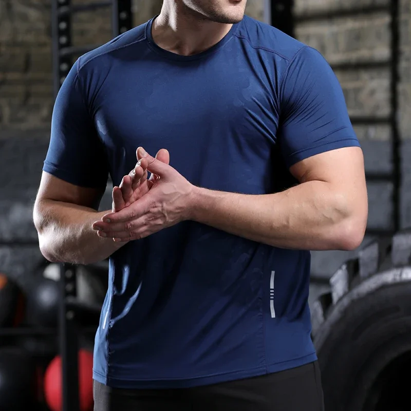 Camiseta deportiva de poliéster para hombre, camisa de compresión para correr, Fitness, gimnasio, entrenamiento al aire libre, ropa de ajuste muscular