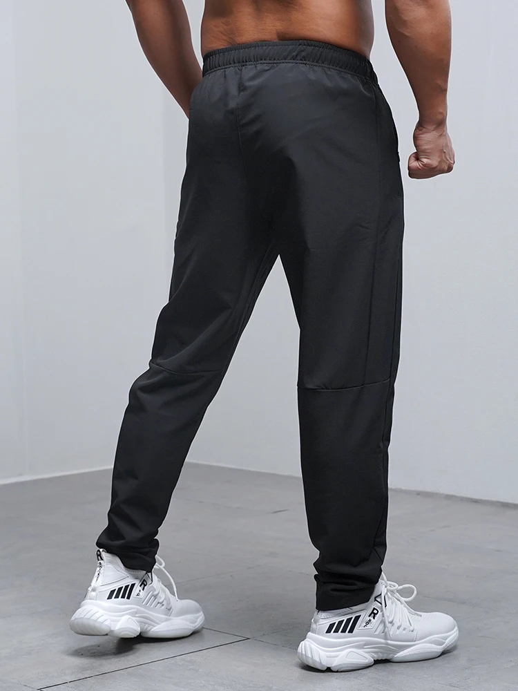 Pantalones Deportivos para Hombre, Transpirables, Holgados, para Correr, Entrenamiento, Gimnasio, Ropa Deportiva, Elásticos, Impermeables, con Bolsillos con Cierre, para Otoño e Invierno