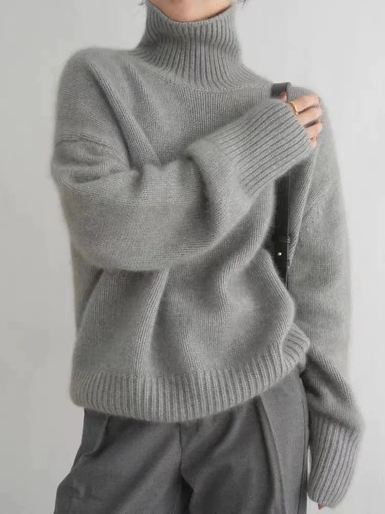 Otoño e Invierno nuevo suéter de lana merina de 100% jersey de punto de cuello alto para mujer tops casuales sueltos de talla grande