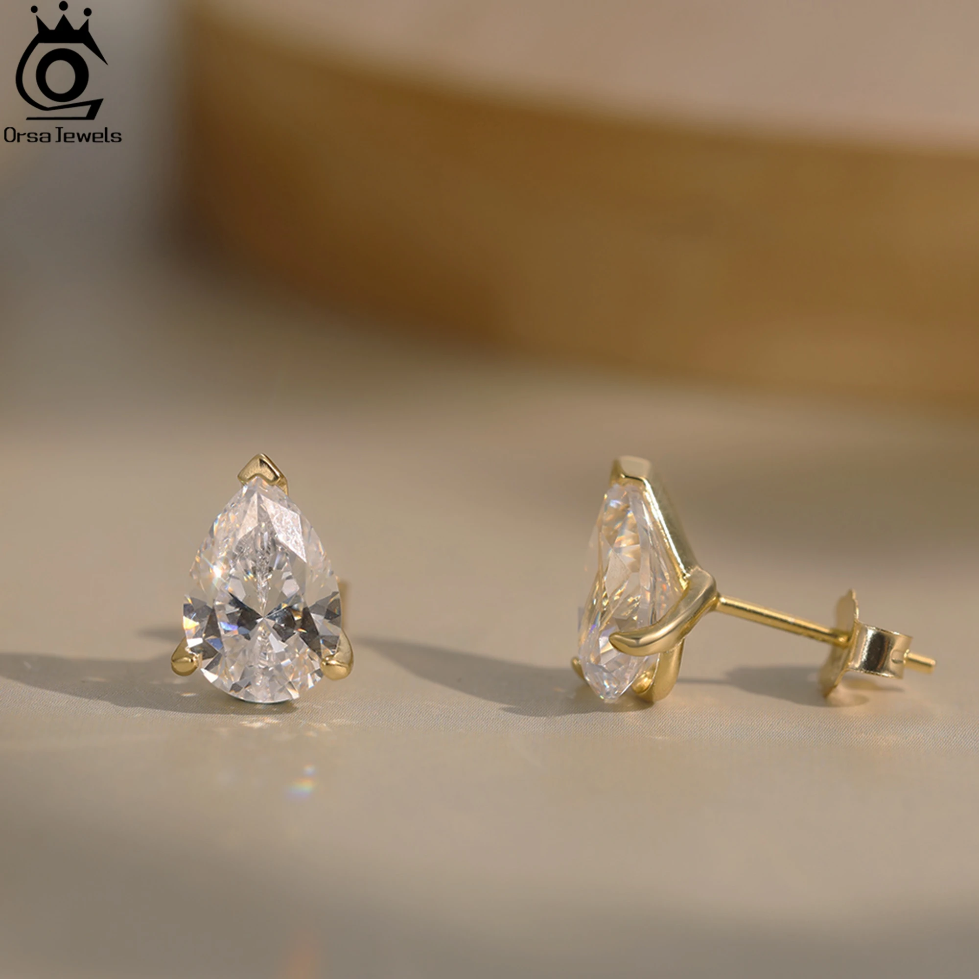 ORSA JEWELS Pendientes tipo botón de plata fina 925 con piedra de circón cortada en forma de gota de agua, joyería elegante e atemporal para mujer LZE02