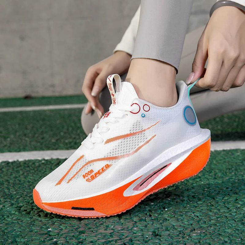 Zapatillas para correr con tabla de carbono Unisex, zapatillas profesionales para maratón, ligeras, con almohadilla que rebota, transpirables, con soporte estable para mujer
