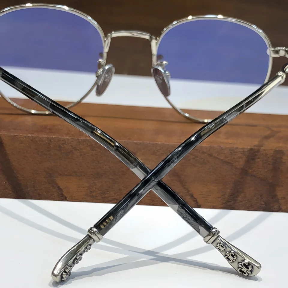 Gafas redondas de aleación de titanio a la moda, montura de gafas de alta calidad, diseño de marca, gafas graduadas ópticas para miopía para hombres y mujeres