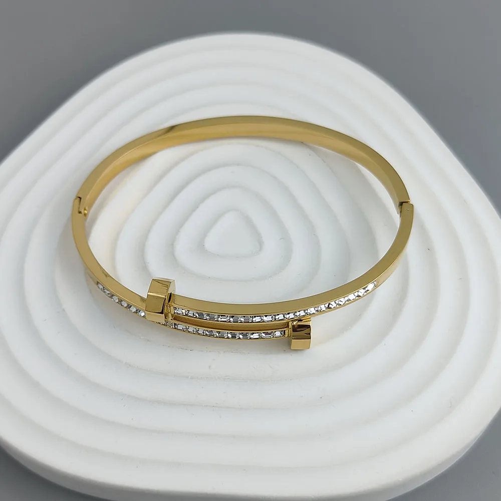 Nueva pulsera chapada en oro de acero inoxidable con circonita para uñas de 18 quilates, pulsera de pareja impermeable de alta calidad, regalo para esposa