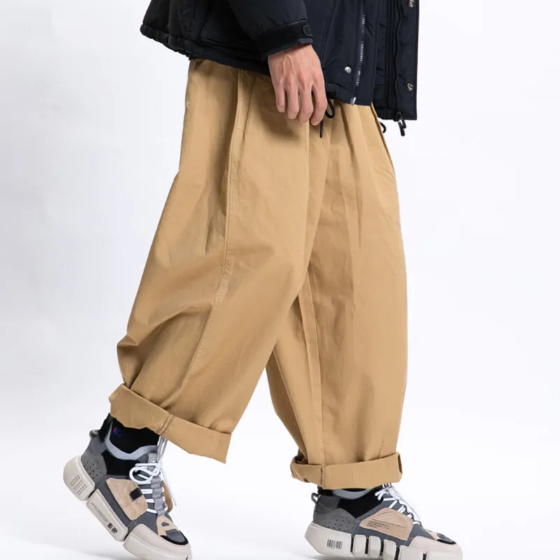 2025 primavera nuevos pantalones casuales Cityboy moda holgada japonesa pantalones de pierna ancha versátiles pantalones de trabajo de Color sólido hombres y mujeres