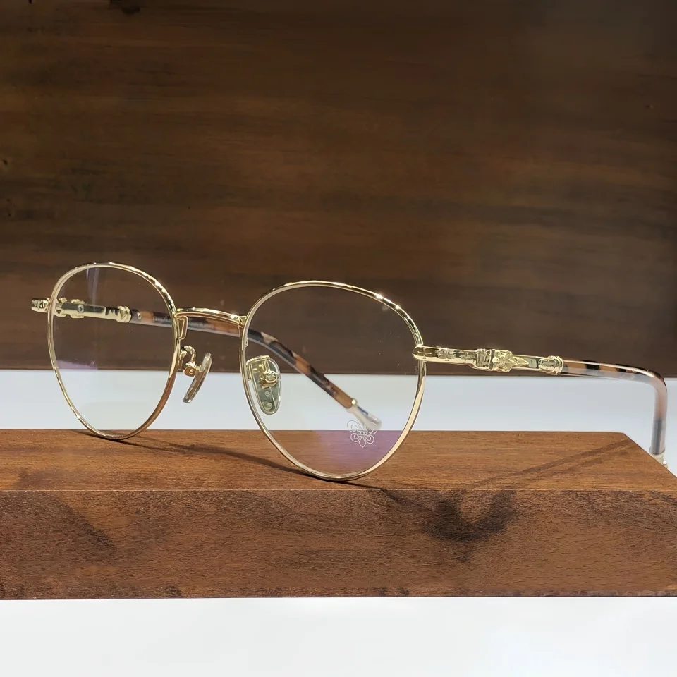 Gafas redondas de aleación de titanio a la moda, montura de gafas de alta calidad, diseño de marca, gafas graduadas ópticas para miopía para hombres y mujeres