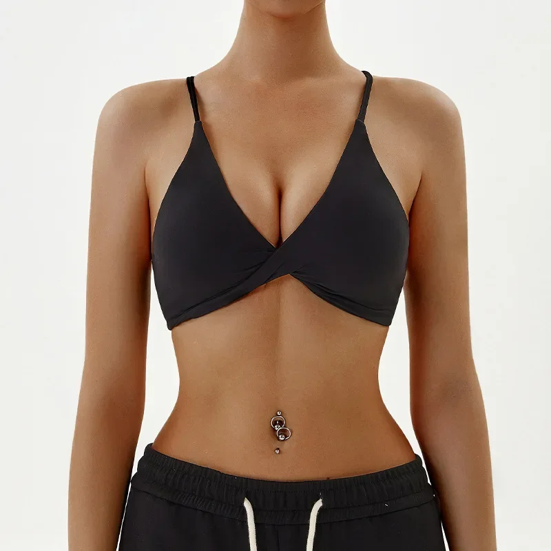 Sujetador deportivo con tirantes cruzados en la espalda para mujer, ropa interior de Color sólido para gimnasio y Yoga, Top deportivo ajustado de alta resistencia, completo con almohadilla para el pecho