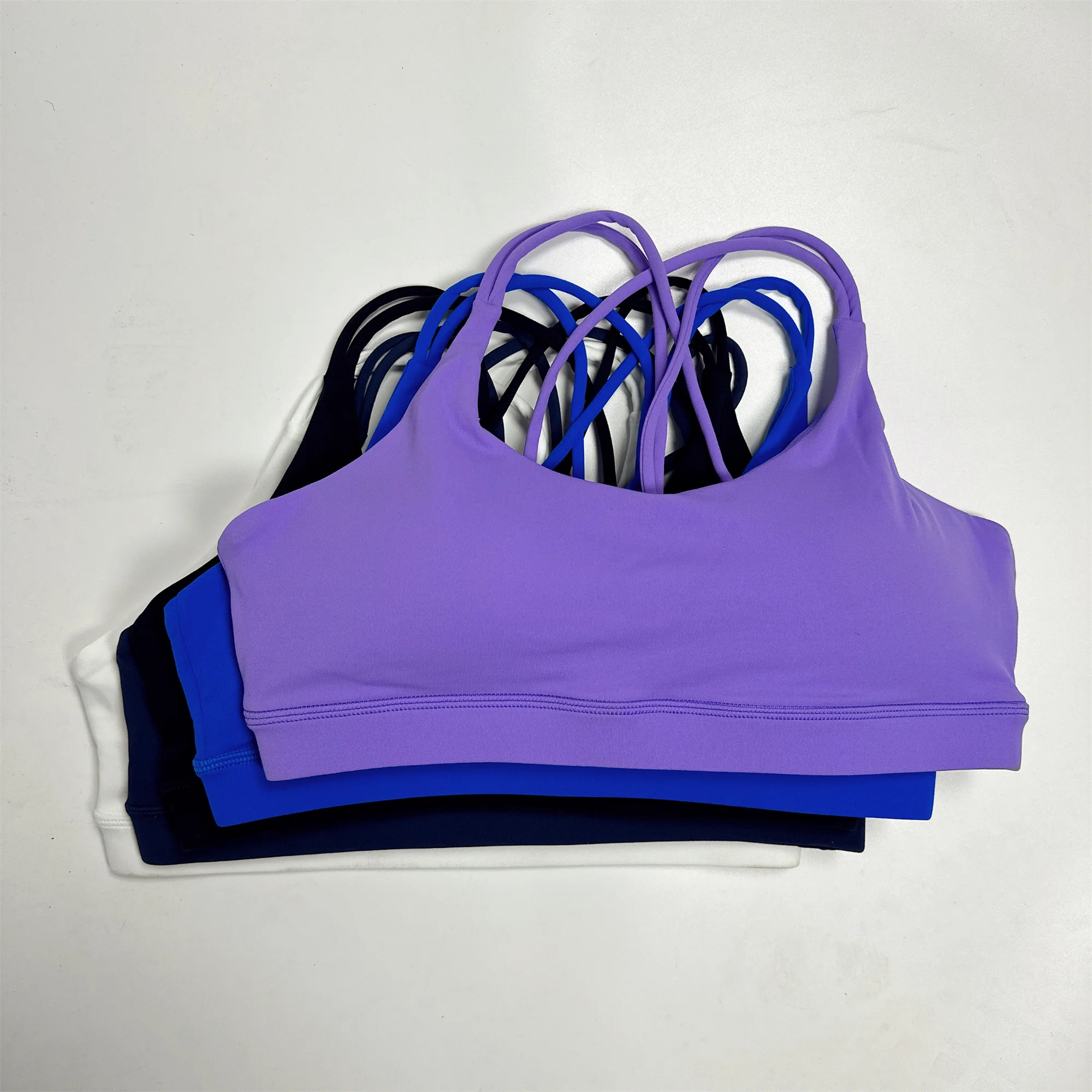 Ropa interior de Yoga para gimnasio de alta resistencia de Color sólido, Sujetador deportivo cruzado para mujer, Top deportivo a prueba de golpes, entrenamiento ajustado atlético con almohadilla para el pecho