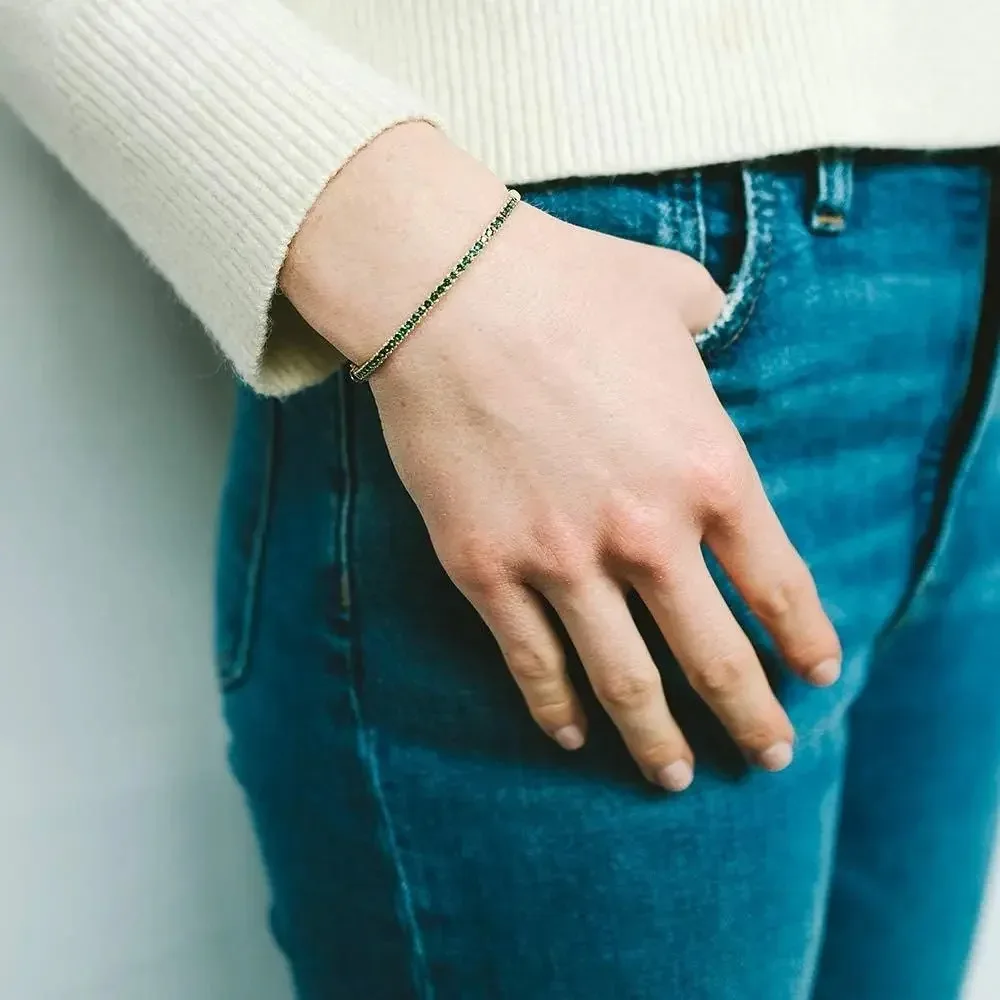 Enlace de prueba. No Comprar. No se realizará la entrega después de realizar el pedido. Este producto es solo para pruebas!! Brazalete de esmeraldas sintéticas en oro amarillo con cierre de doble seguridad.