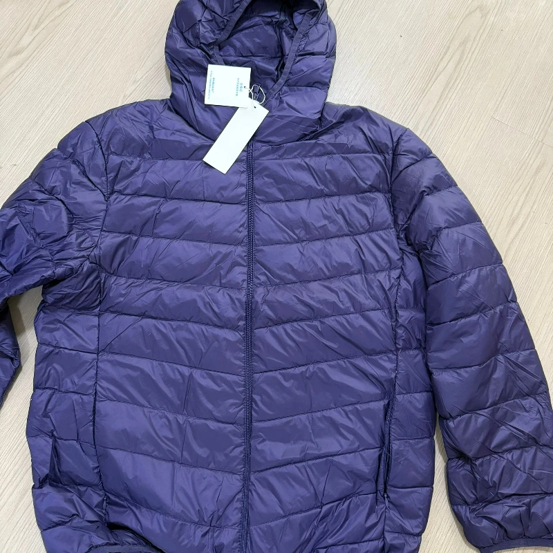 2025 Otoño e Invierno nueva chaqueta ligera de plumón para hombre corta con capucha Joker ligero fino plumón de pato blanco abrigo de talla grande