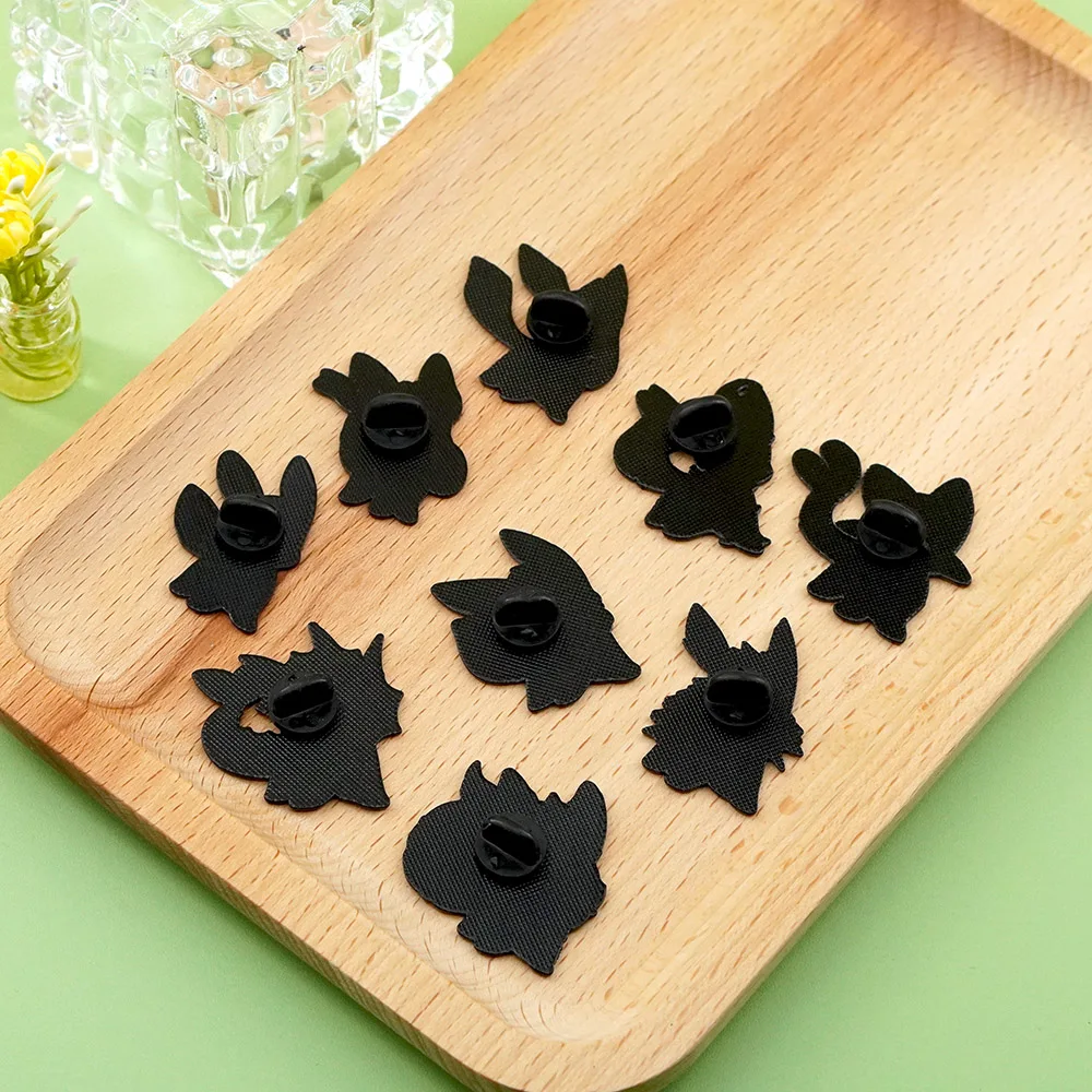 Set de 9 Broches Esmaltados de Anime Pokémon Eevee, Monstruos Élficos, Animales de Moda, Broches de Solapa para Mujer, Joyería de Regalo Festivo
