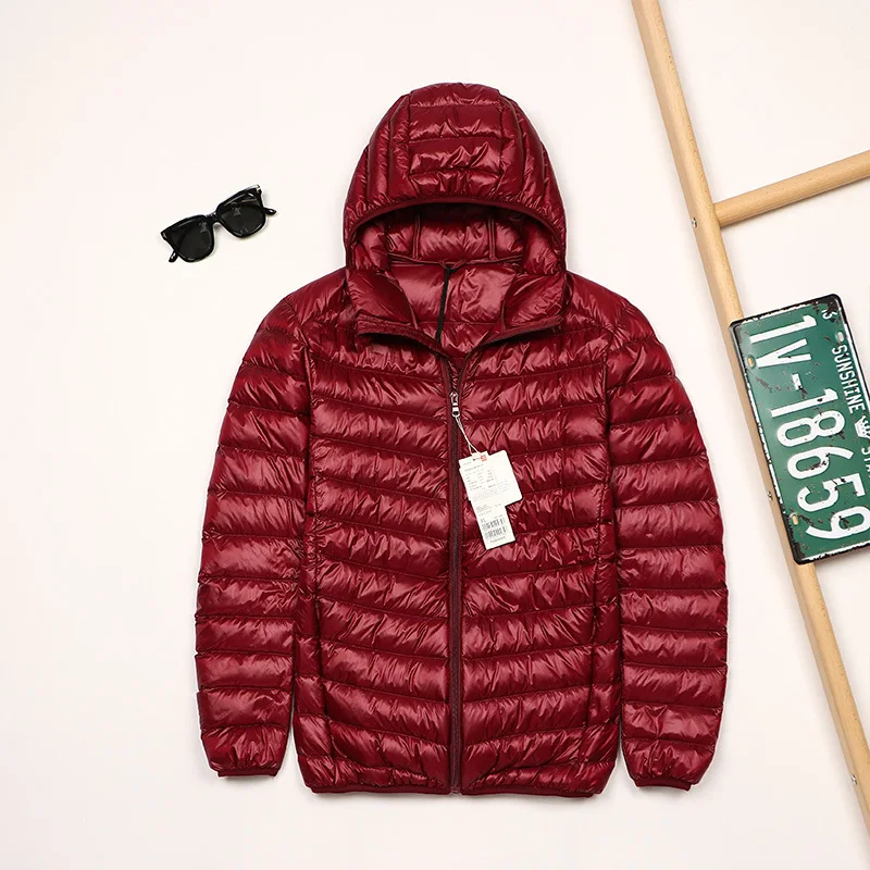 2025 Otoño e Invierno nueva chaqueta ligera de plumón para hombre corta con capucha Joker ligero fino plumón de pato blanco abrigo de talla grande