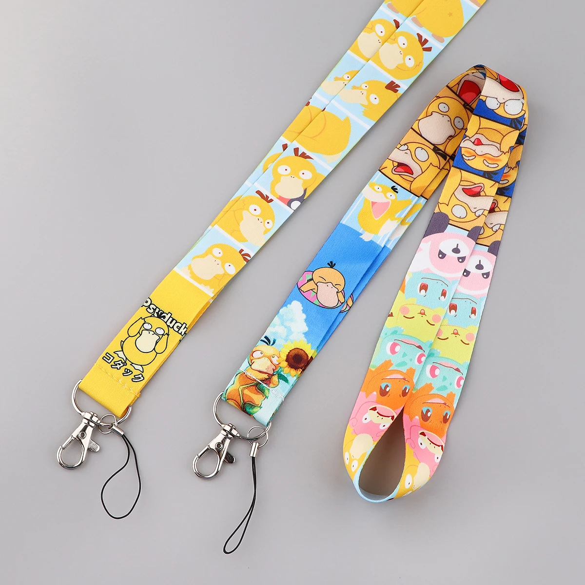 Venta al por mayor, mezcla de 5/10/20 piezas/juego, bonita correa para el cuello con diseño de elfo monstruo de anime, para teléfono, llaves, tarjetas de identificación, accesorios geniales, regalo para amigos