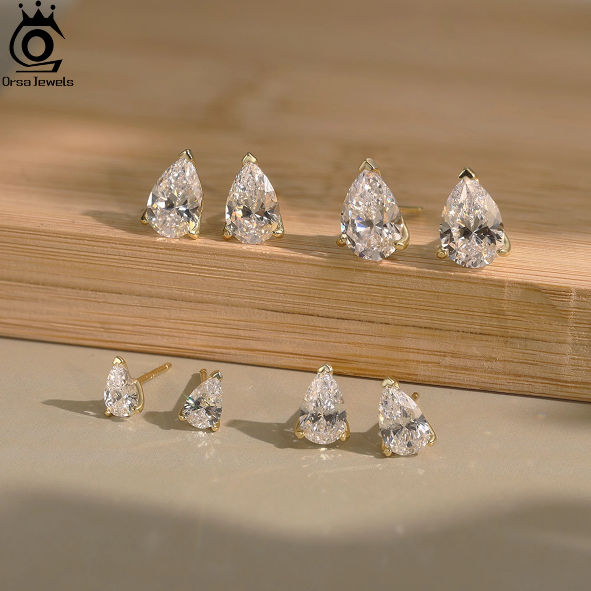 ORSA JEWELS Pendientes tipo botón de plata fina 925 con piedra de circón cortada en forma de gota de agua, joyería elegante e atemporal para mujer LZE02