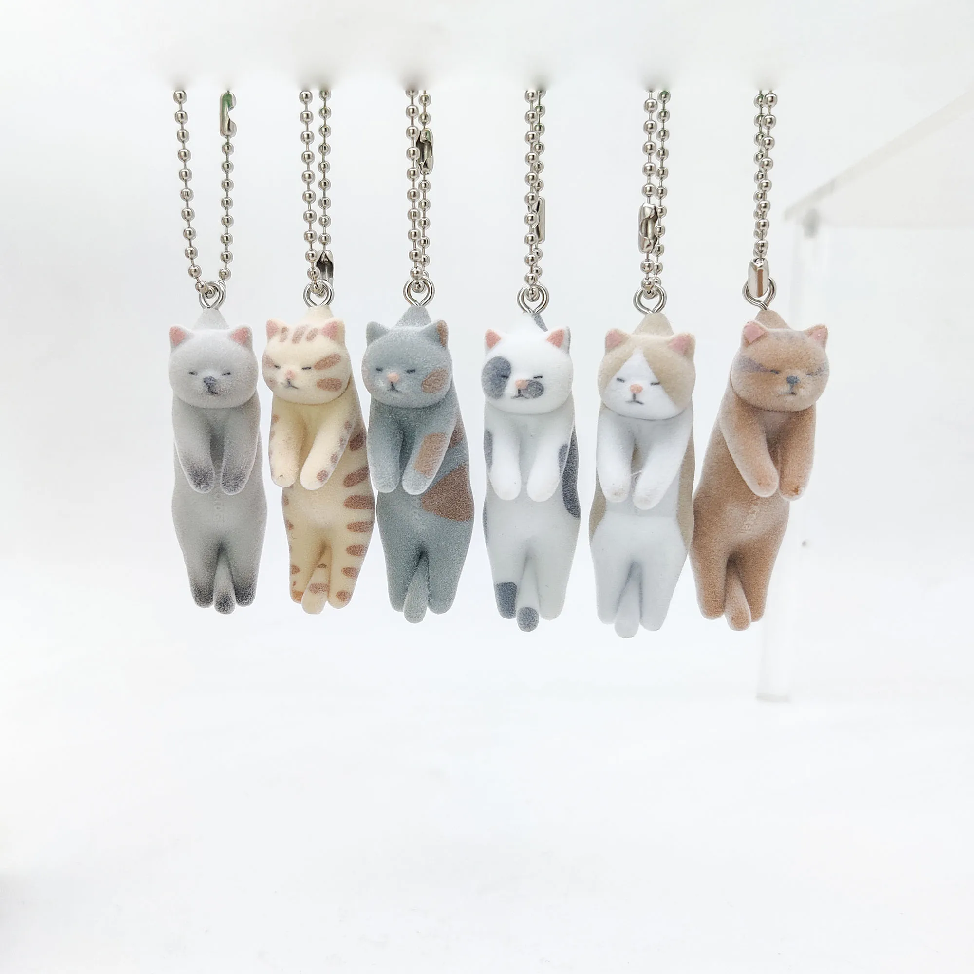 Qualia cápsula de juguete Tsumada Neko 3 mascota flocosa pellizco gato bola cadena lindo manchado bicolor exótico pelo corto tonkinese gatito