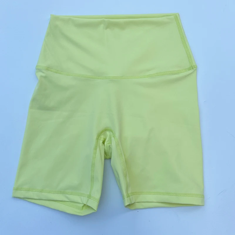 Pantalones cortos deportivos para mujer, pantalones cortos de Yoga de cintura alta, ajustados, levantadores de glúteos, gimnasio, correr, pantalones cortos de nailon de alta elasticidad