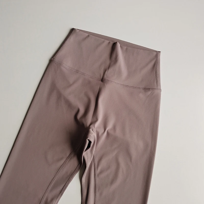 Pantalones deportivos elásticos ajustados sin costuras Yoga desnudo cintura alta levantamiento de cadera secado rápido mallas deportivas para correr ropa al aire libre