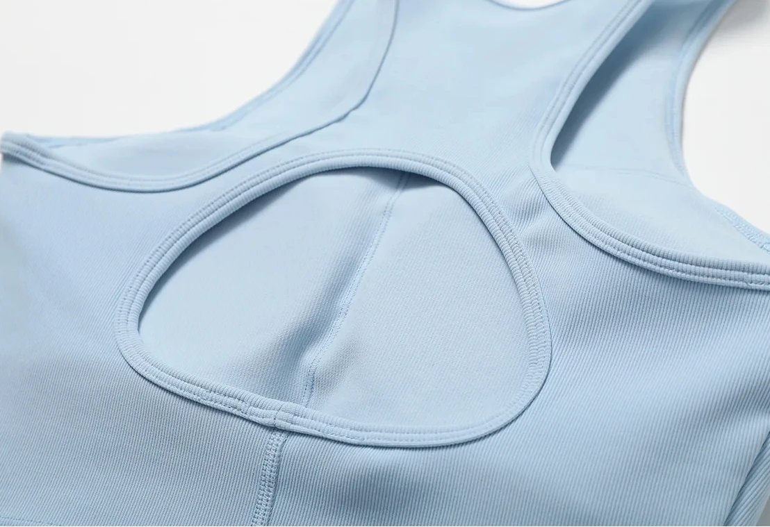 Nuevas mujeres a prueba de golpes recogidas Fitness Push Up ropa interior femenina Crop Tops correr gimnasio entrenamiento deportes sujetador copas fijas Yoga chaleco Tops
