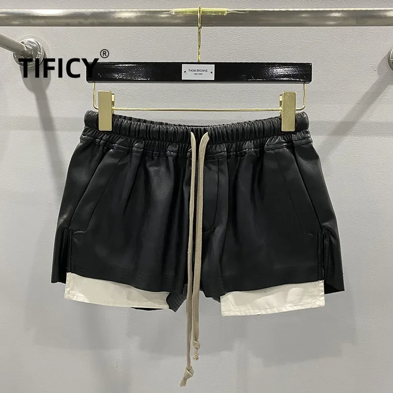 Pantalones cortos cómodos con cuatro bolsillos en las esquinas de cuero PU básico a la moda para mujer nuevos pantalones cortos negros versátiles