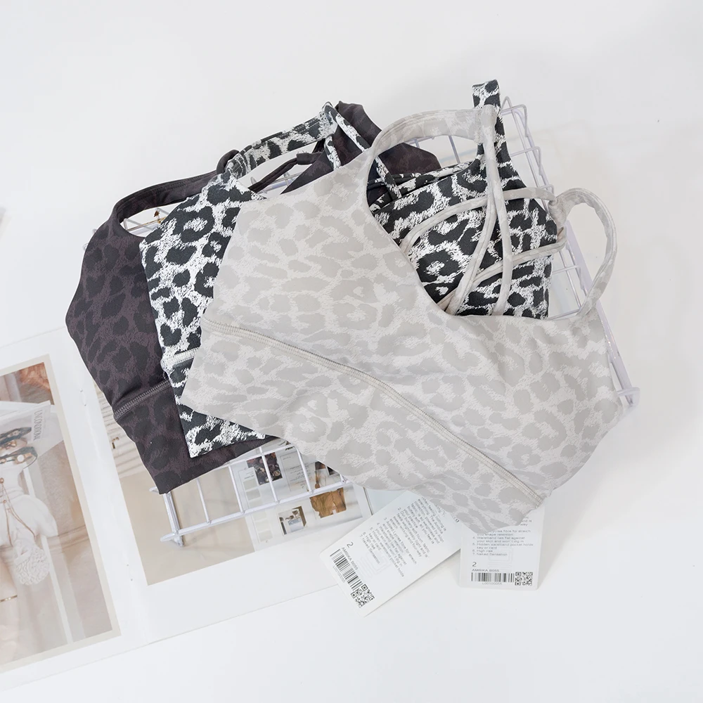 Sujetador deportivo con estampado de leopardo, chaleco de yoga europeo y americano, sujetador fijo con sensación desnuda, fitness que absorbe los golpes y parte de atrás bonita