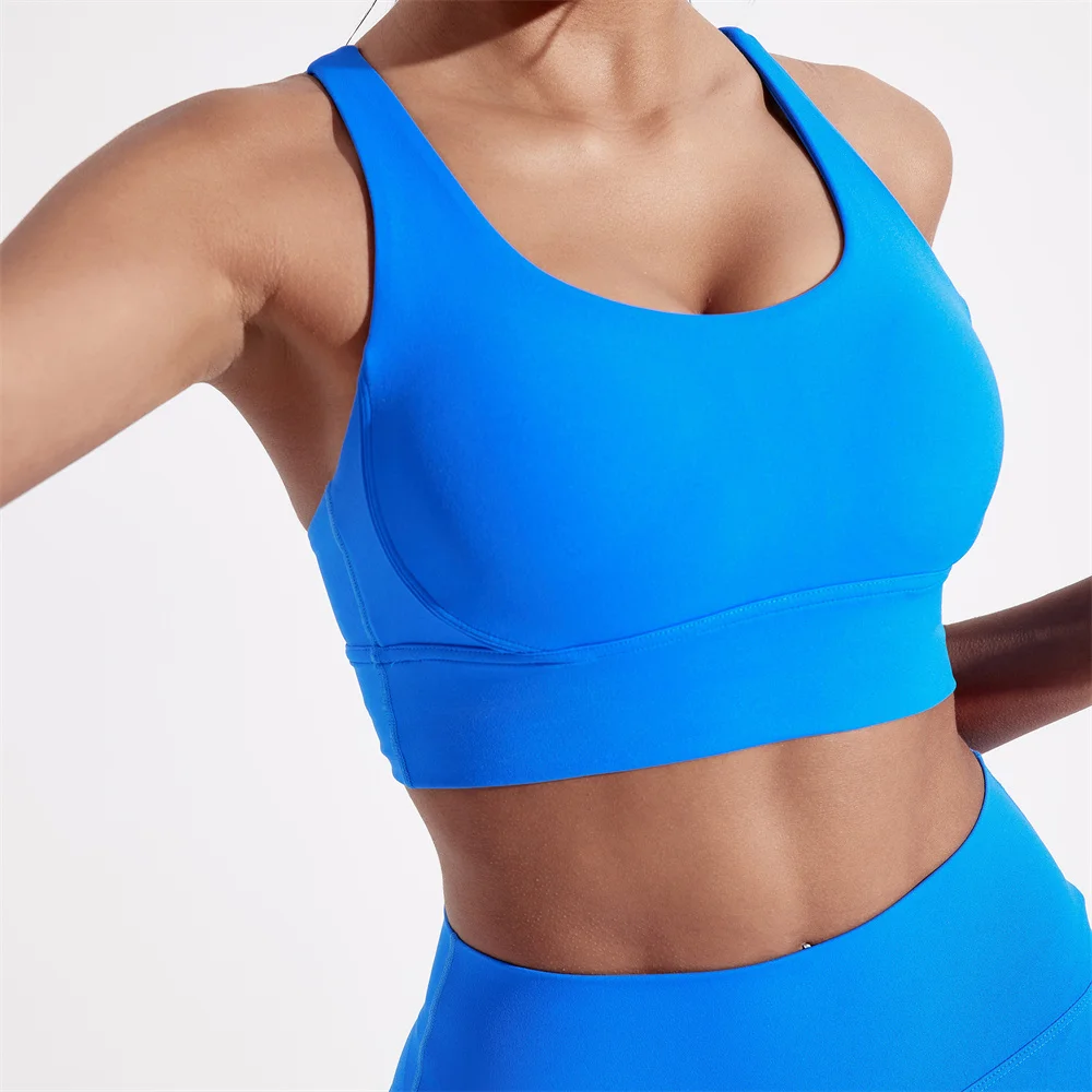 Sujetador deportivo de Color sólido para mujer, top suave y ajustado, entrenamiento integral, trote, gimnasio, yoga, ropa interior, espalda cruzada con almohadilla para el pecho