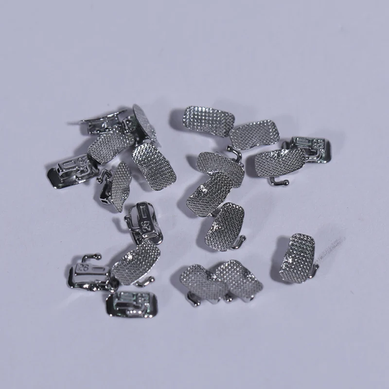 Productos dentales Base de malla 1/2 tubo molar tubos bucales de ortodoncia Roth 022 ortodoncia