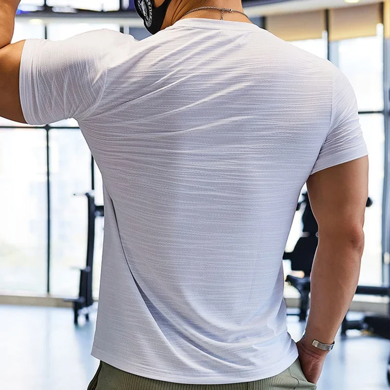 Camiseta de compresión de entrenamiento muscular para hombre, camiseta de ajuste seco para correr, camisetas de gimnasio de talla grande, Tops deportivos para hombre, sudadera de Color liso