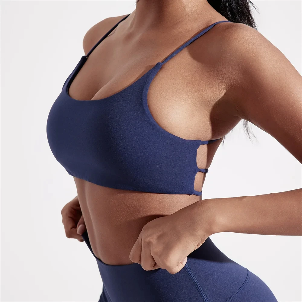 Ropa interior de Color sólido con espalda cruzada para mujer, Sujetador deportivo para Fitness, Top para Yoga, entrenamiento integral, almohadilla para el pecho, correa de espagueti, belleza