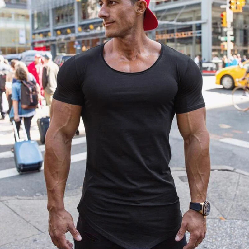 Camiseta deportiva para correr de Color sólido para hombre, camiseta ajustada de manga corta transpirable de algodón, camiseta de entrenamiento físico para culturismo y gimnasio