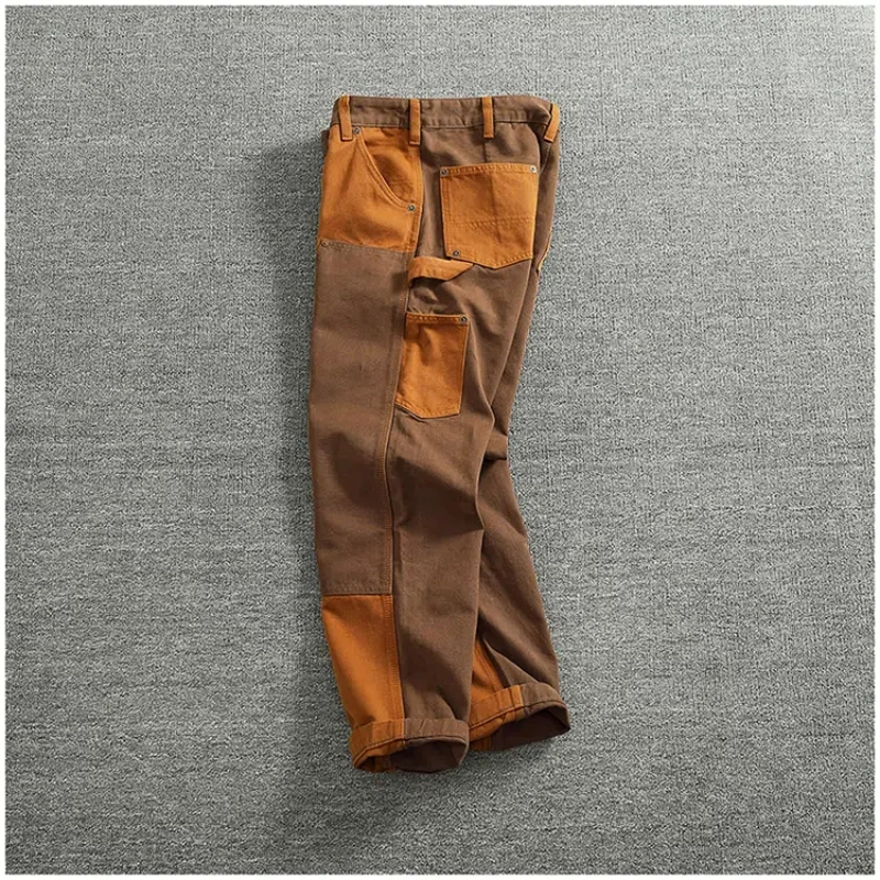 Otoño e Invierno pesado de gama alta vintage monos hombres grano de lona color patchwork registro motocicleta pantalones casuales marea