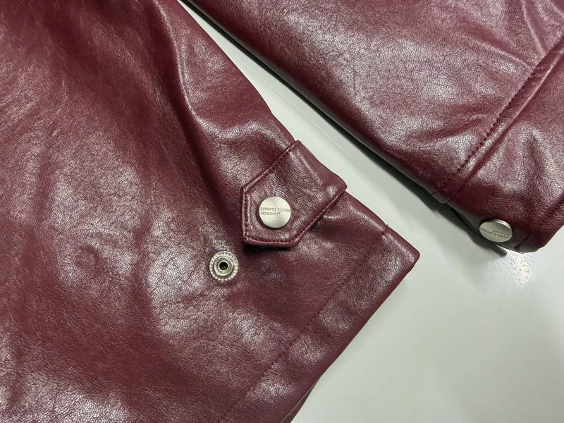 Chaqueta de cuero estampada bordada 2026ss, chaquetas de mujer informales holgadas de color Burdeos de alta calidad para hombre y mujer