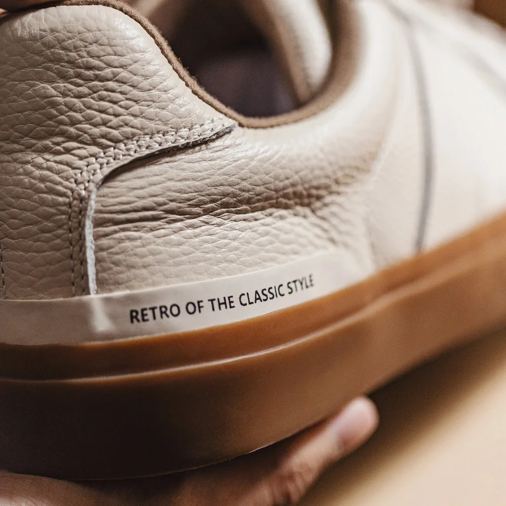 Maden nuevos zapatos de entrenamiento cómodos de cuero de grano completo para hombres zapatillas bajas transpirables versátiles de uso diario zapatos casuales al aire libre