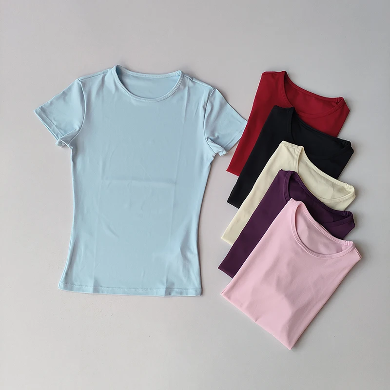 Ropa de Yoga de Color sólido con detección desnuda para mujer, camiseta ajustada elástica de secado rápido de manga corta, ropa deportiva, ropa superior